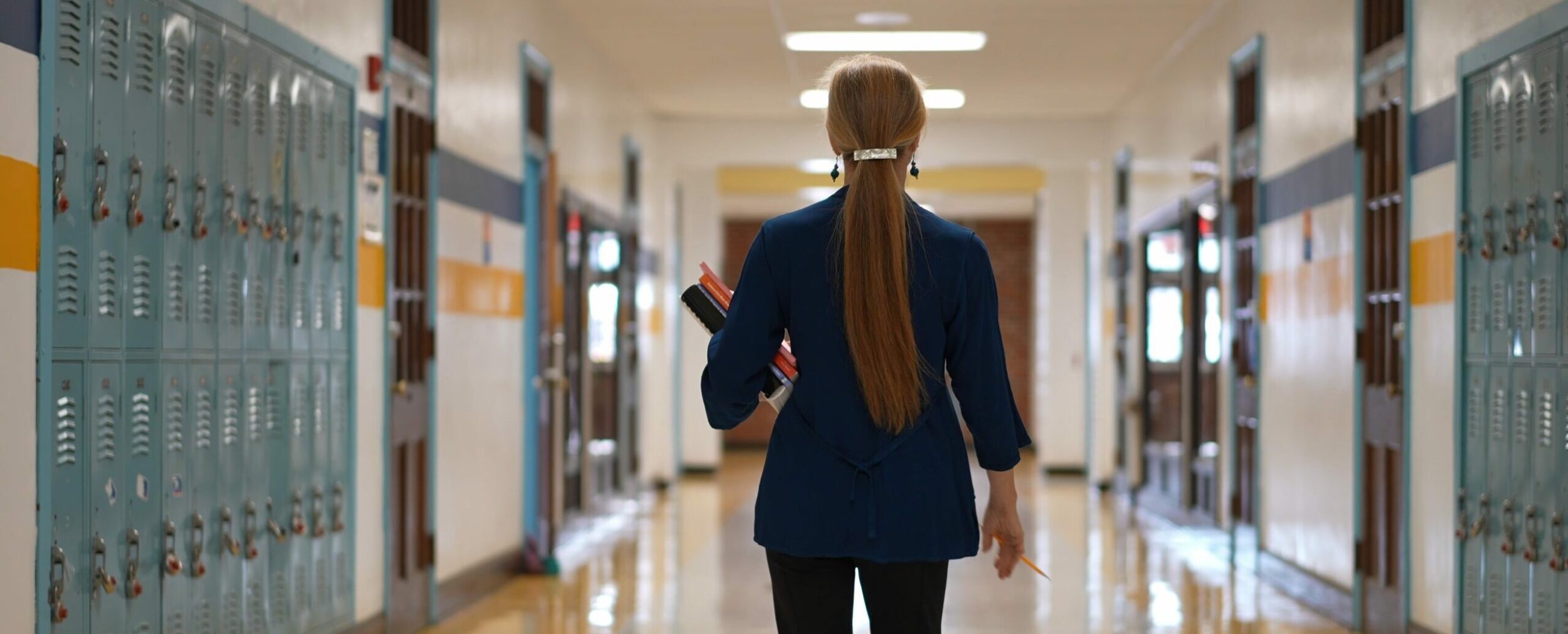 Overcome Learning Loss image 12 (name walking down corridor in school e1708112884338)